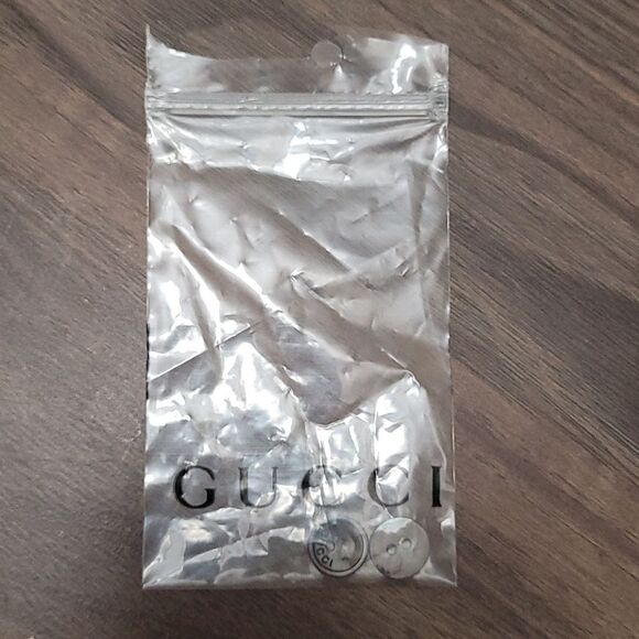 GUCCI Set of Two 2-Hole Bronze Iridescent Buttons Engraved w/ 'GUCCI' - Picture 4 of 4